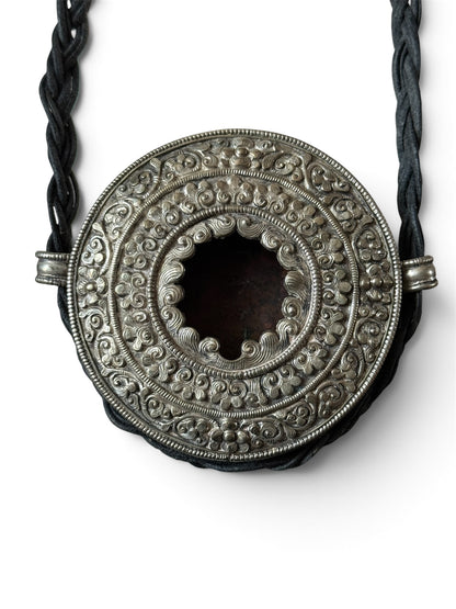 Antique Tibetan Silver Ghau (Portable Carrying Shrine) with Intricate Repoussé Decoration and Brass Back Cover
