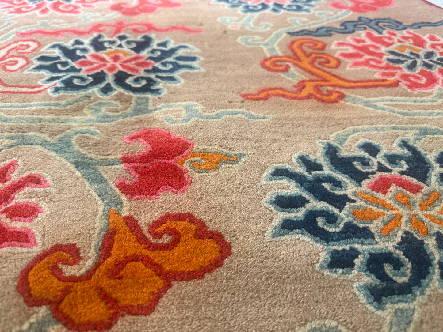 An early to mid 20th C., antique Tibetan floral  cushion rug