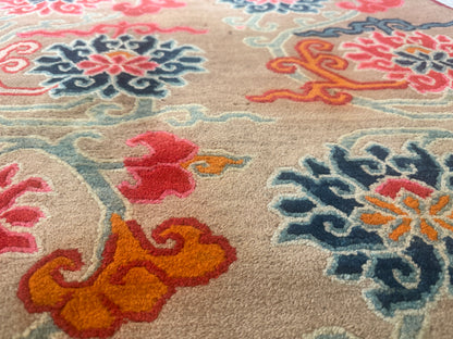 An early to mid 20th C., antique Tibetan floral  cushion rug