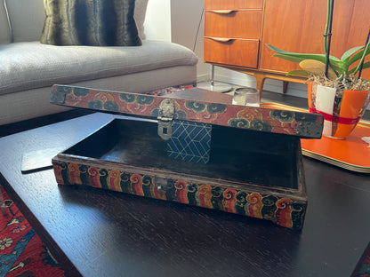 An antique rectangular flat Tibetan wood box