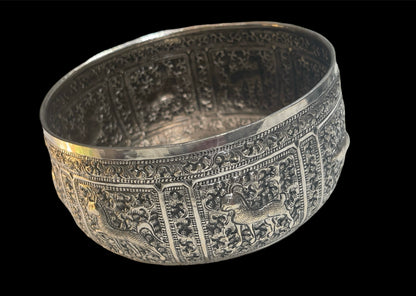 An antique south East Asian silver repousse bowl