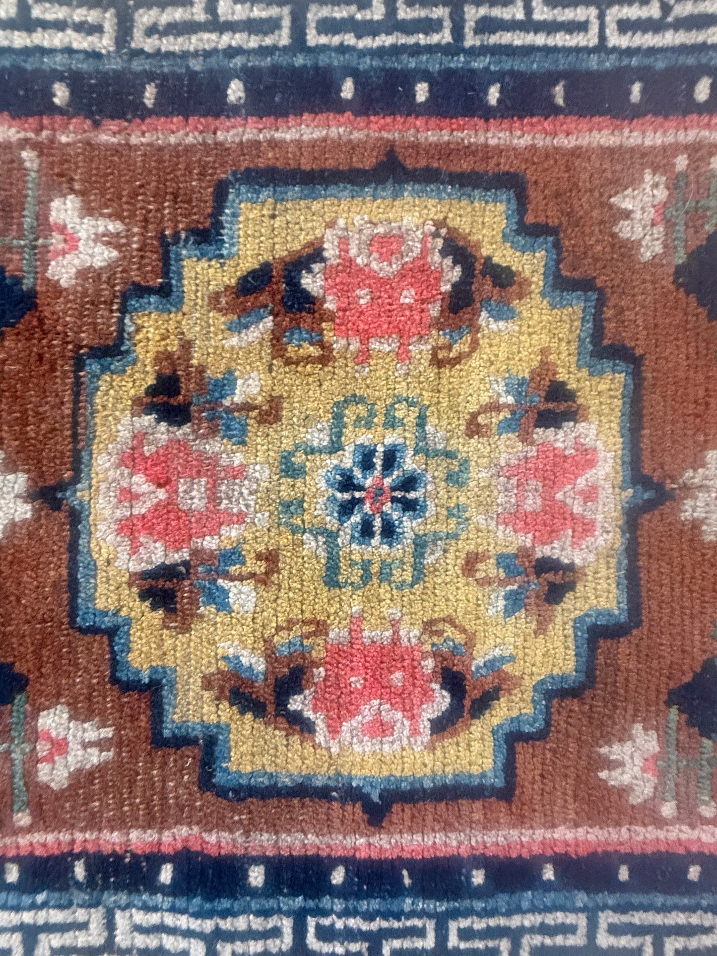 Antique meditation seat rug