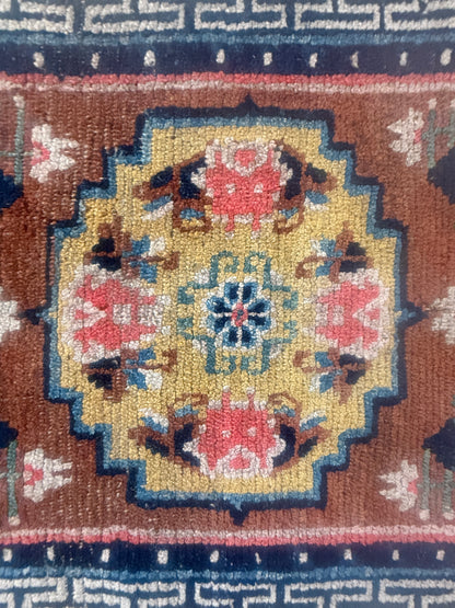 Antique meditation seat rug