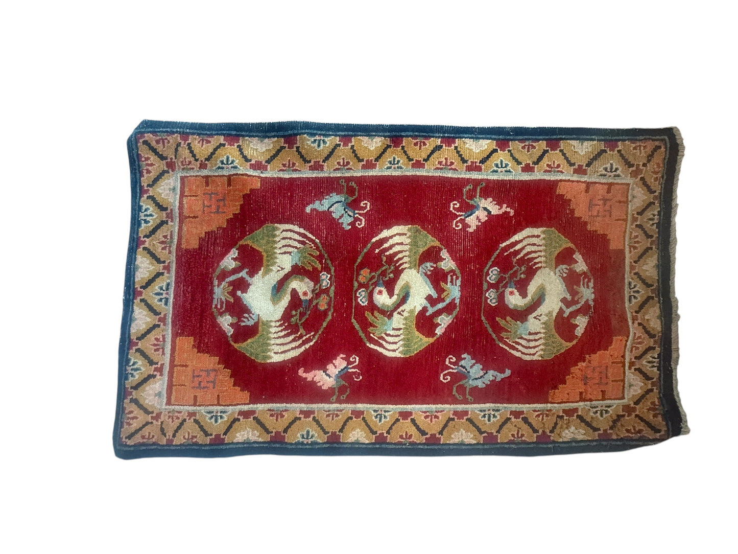 An antique Tibetan rug