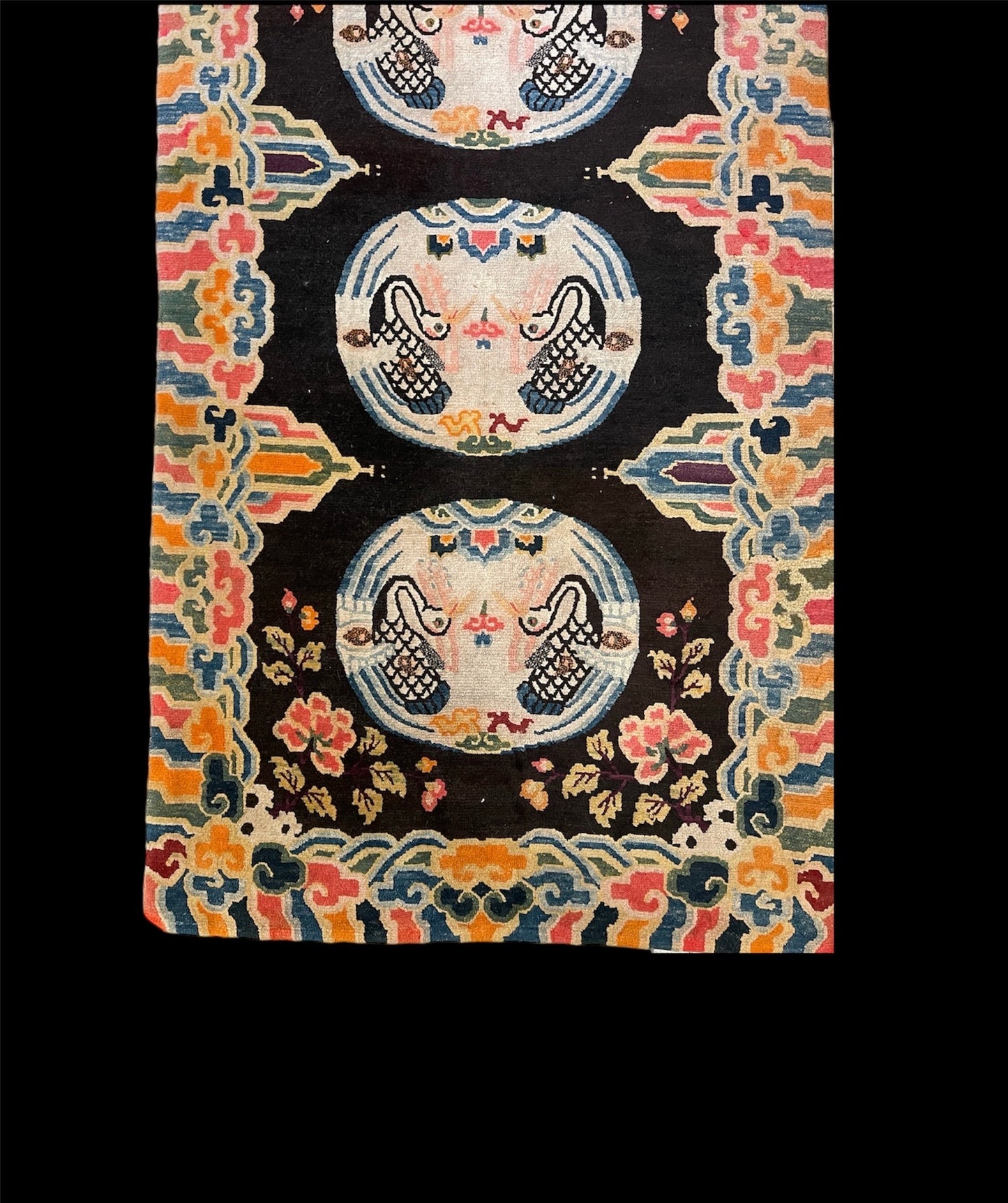 An antique early 20th c., Tibetan rug