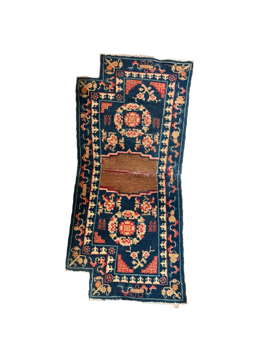 A vintage indigo saddle rug