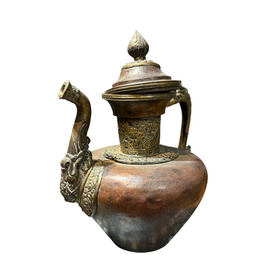 An antique Tibetan bronze teapot