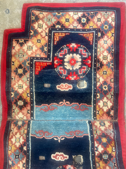 Antique Tibetan saddle rug