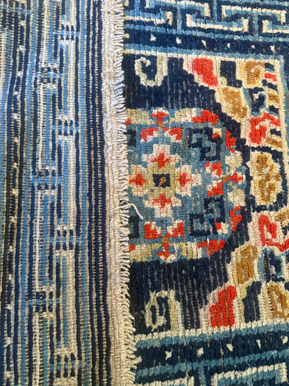 Antique 19th Century navy blue Tibetan woolen rug