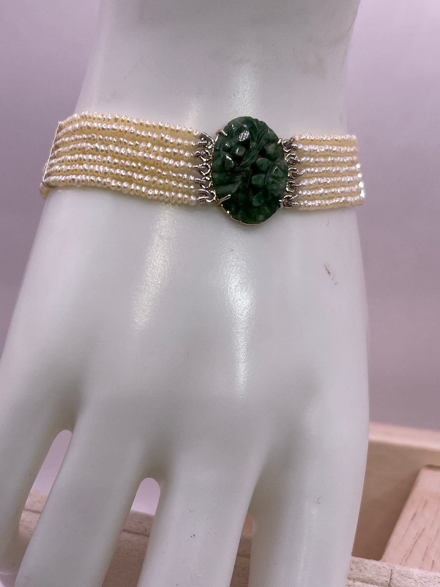 an antique seed pearl and jade plaque bracelet