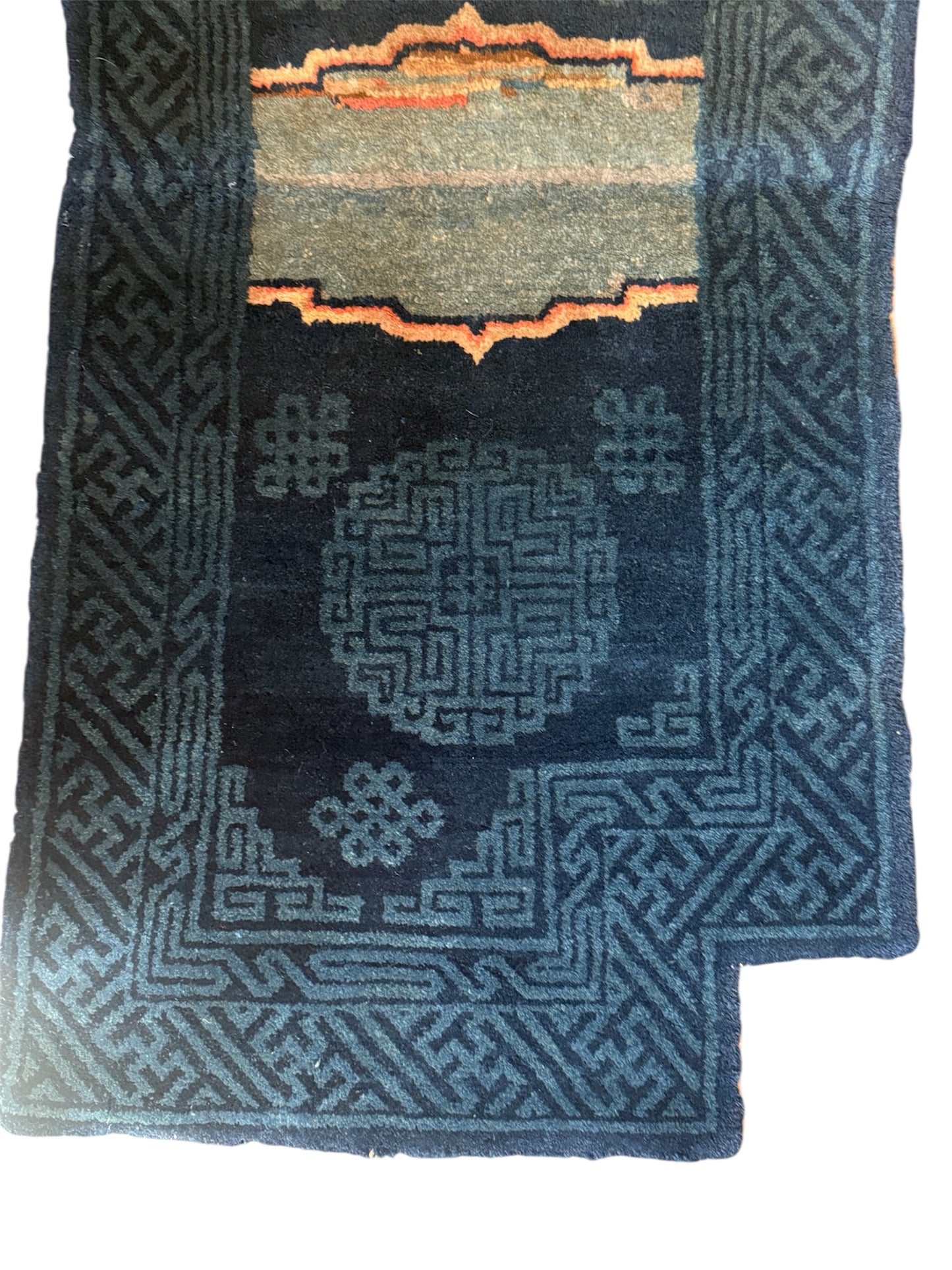 A vintage indigo Tibetan saddle rug
