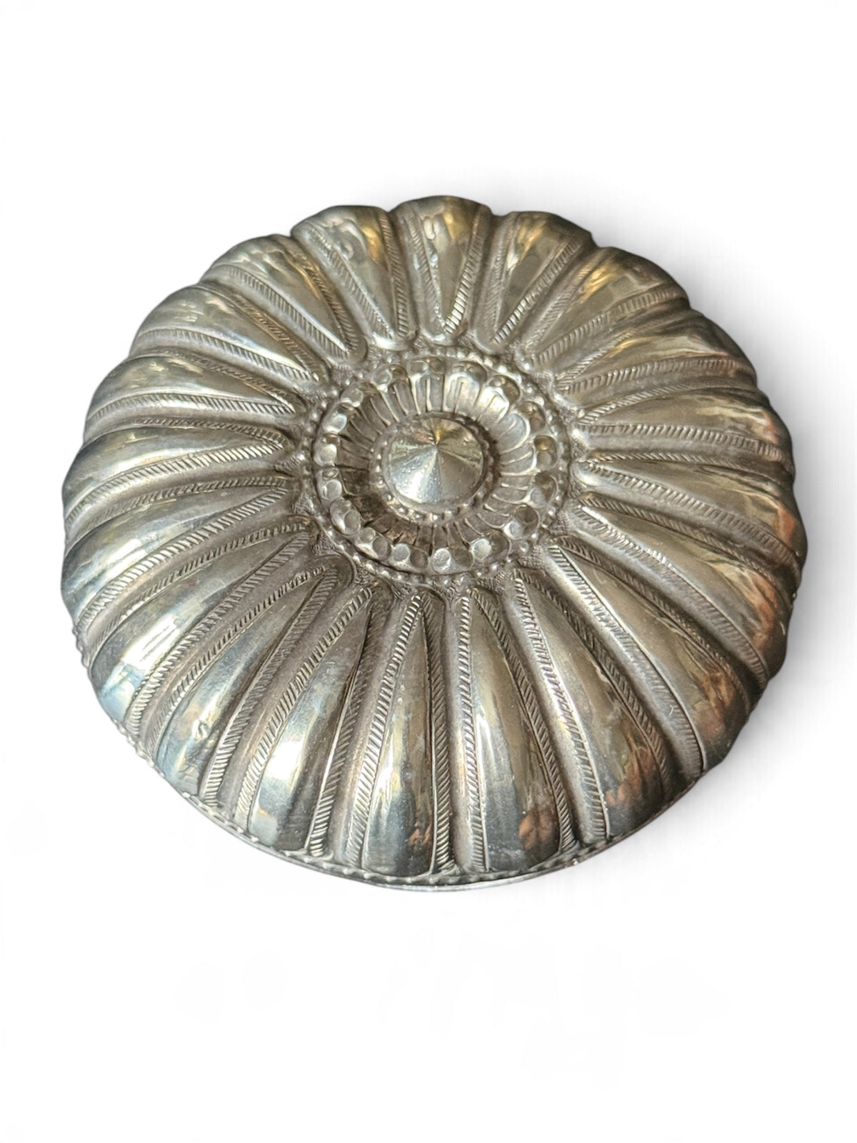 An antique silver south East Asian round box with lid
