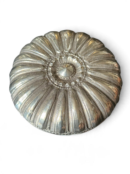 An antique silver south East Asian round box with lid