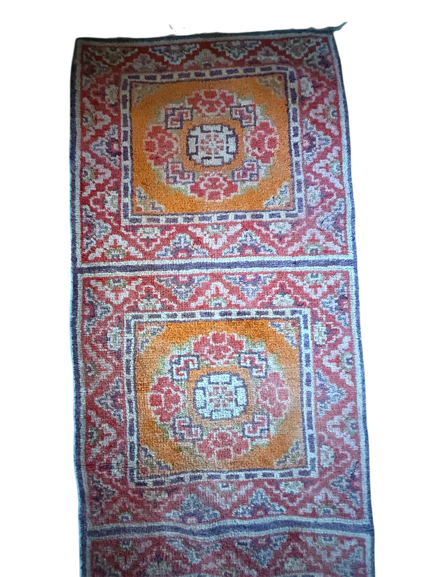An antique triple seater Tibetan meditation rug
