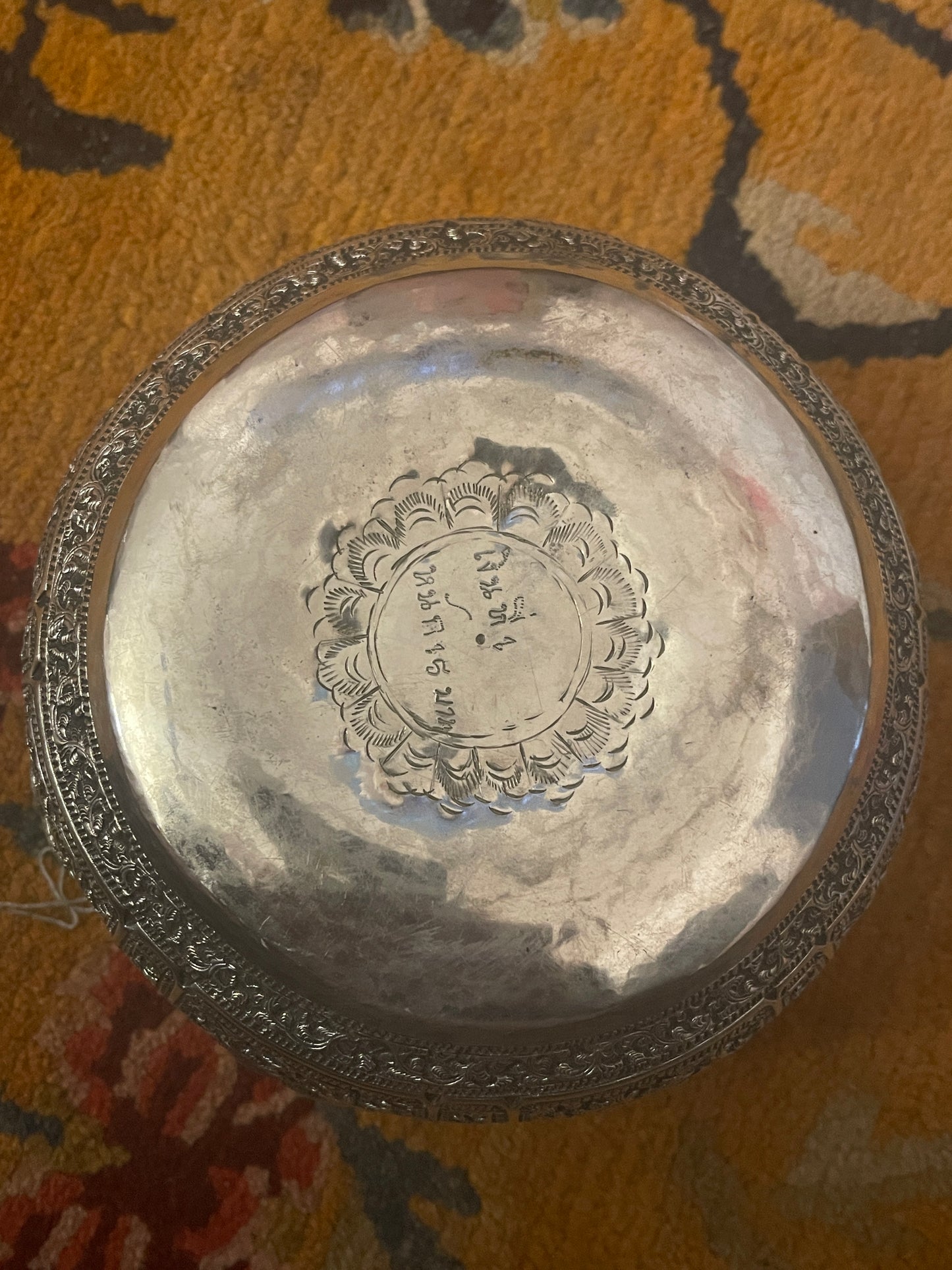 An antique south East Asian silver repousse bowl