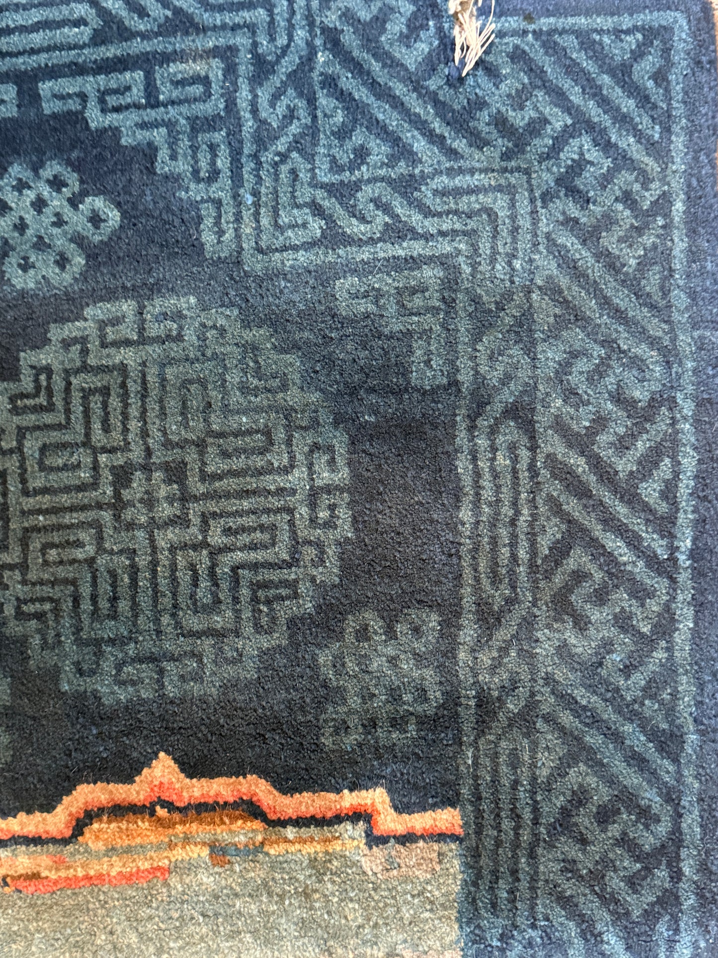 A vintage indigo Tibetan saddle rug