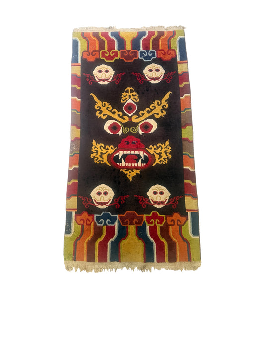 A mid 20th C.,vintage Tibetan religious rug   rug