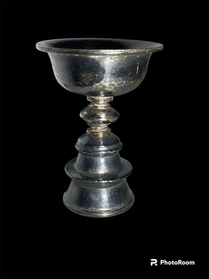 A set of 6 antique Tibetan silver butter lamps