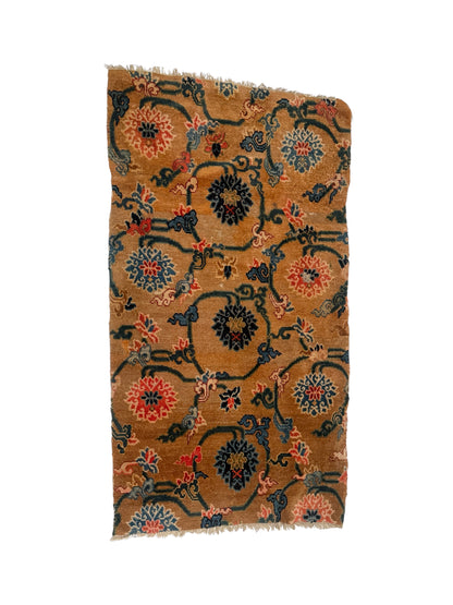 An antique  Tibetan  rug