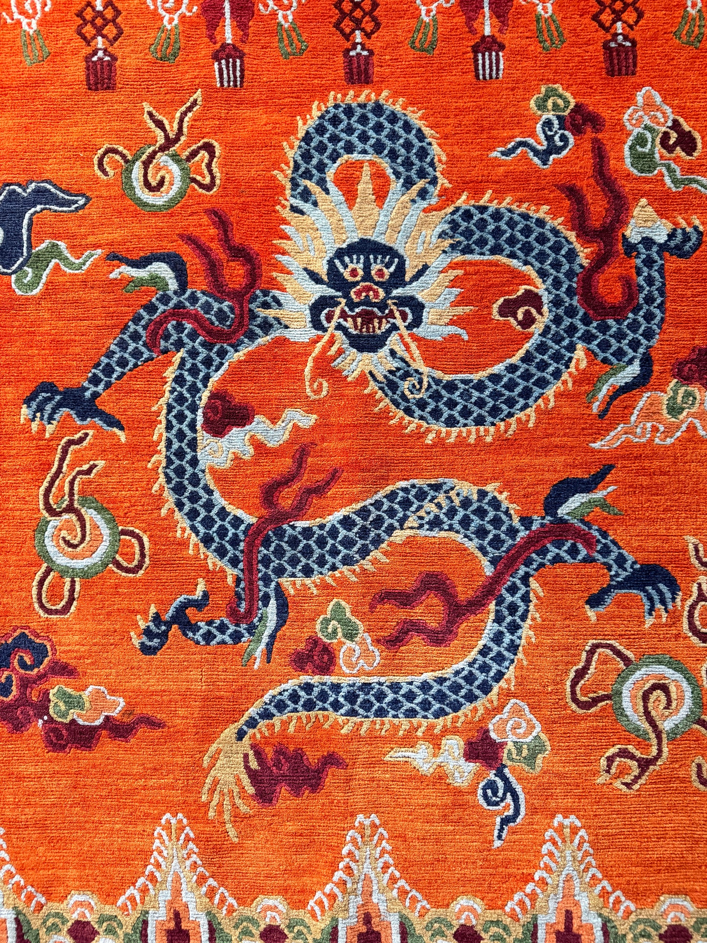 A vintage Tibetan dragon door rug