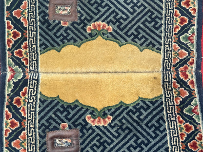 A mid 20th C.  Tibetan saddle rug