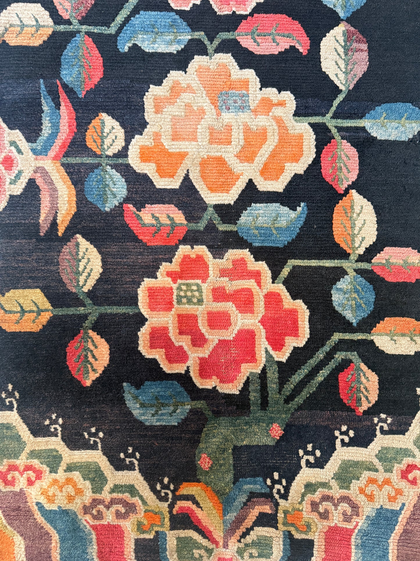 An early 20th C., antique Tibetan floral  rug