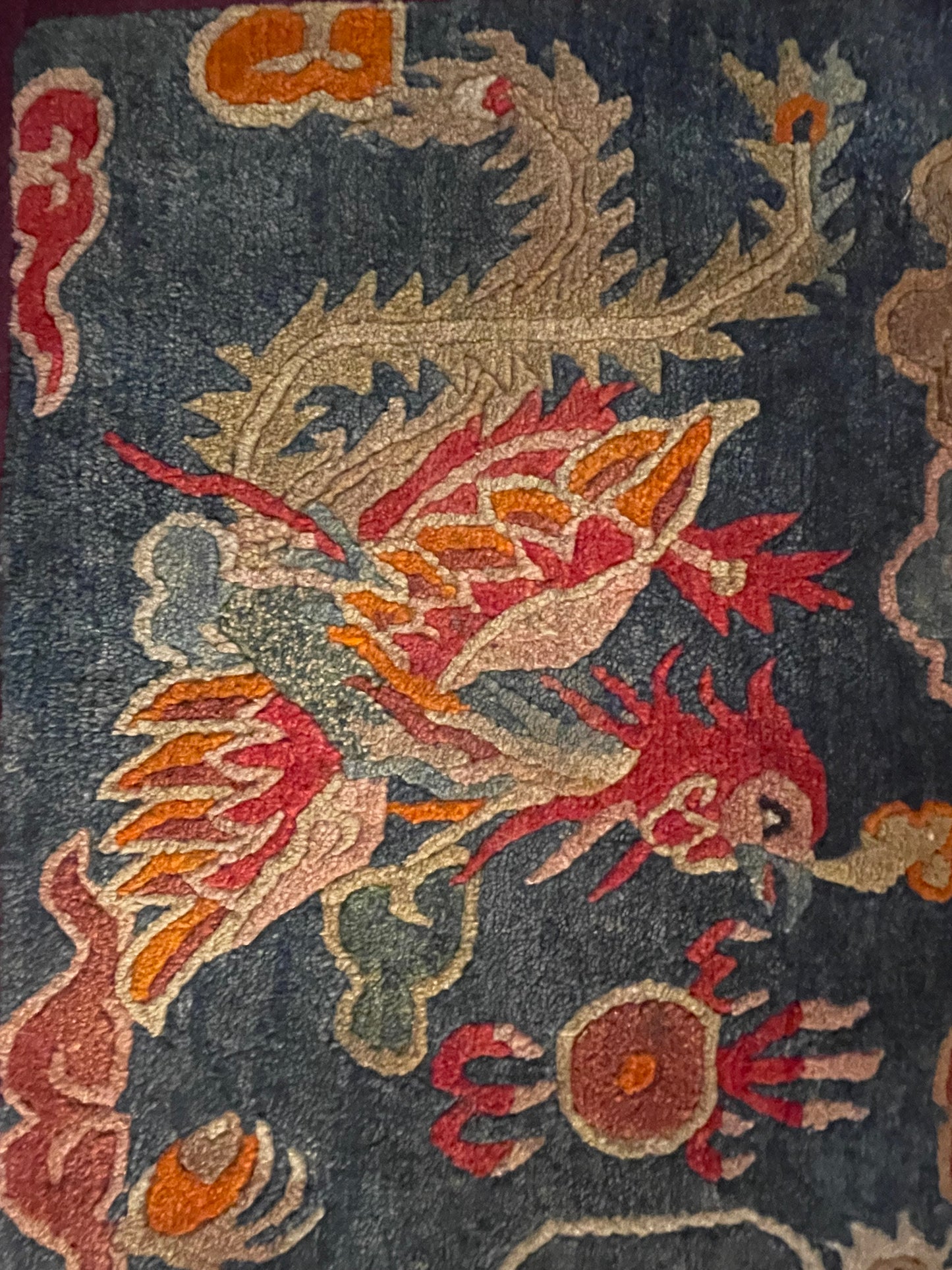 Early 20th C., antique Tibetan dragon and phoenix rugs