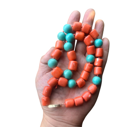 A coral and turquoise bead necklace
