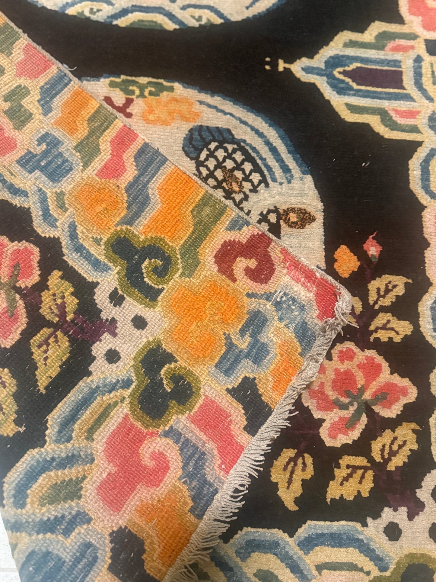 An antique early 20th c., Tibetan rug