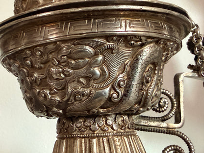 An antique silver and gilt ceremonial Tibetan teapot