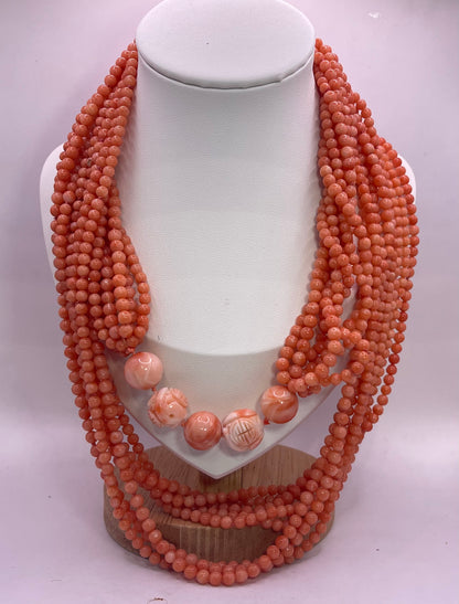 A multi strand coral bead necklace
