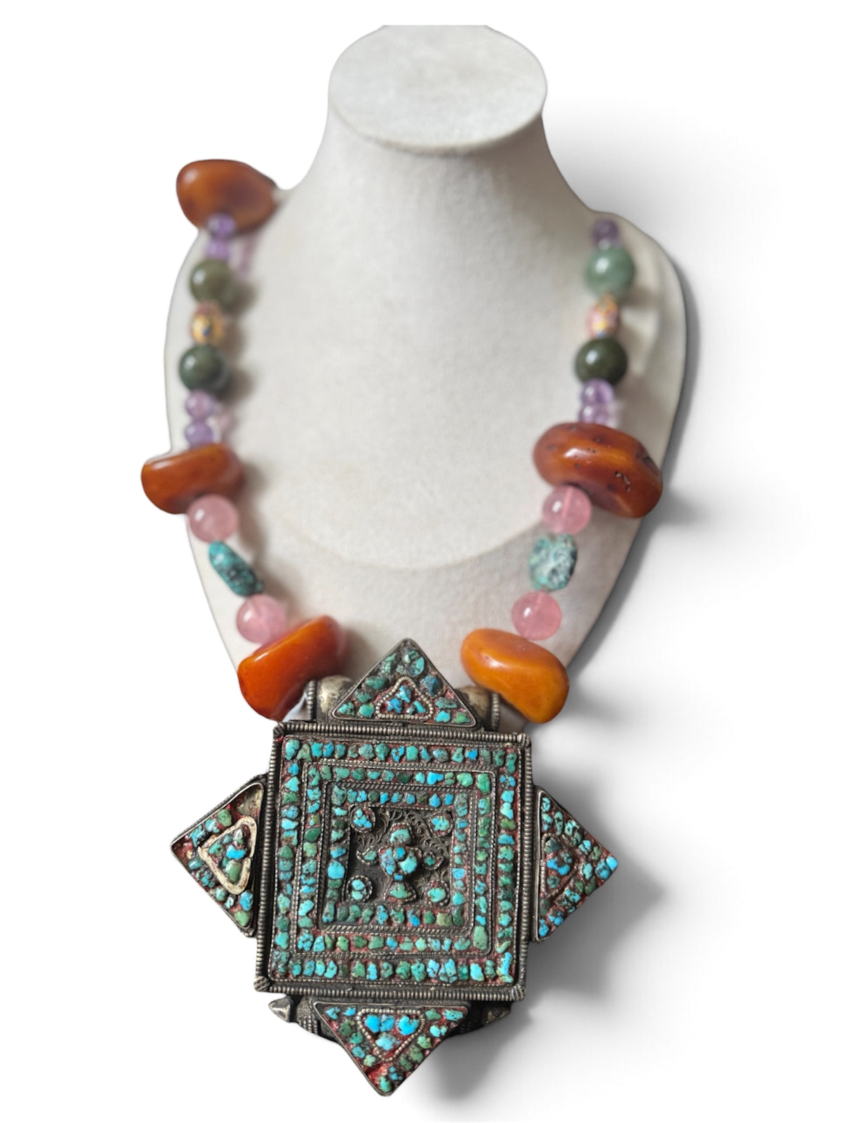 A vintage Tibetan ghau necklace