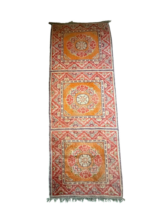 An antique triple seater Tibetan meditation rug