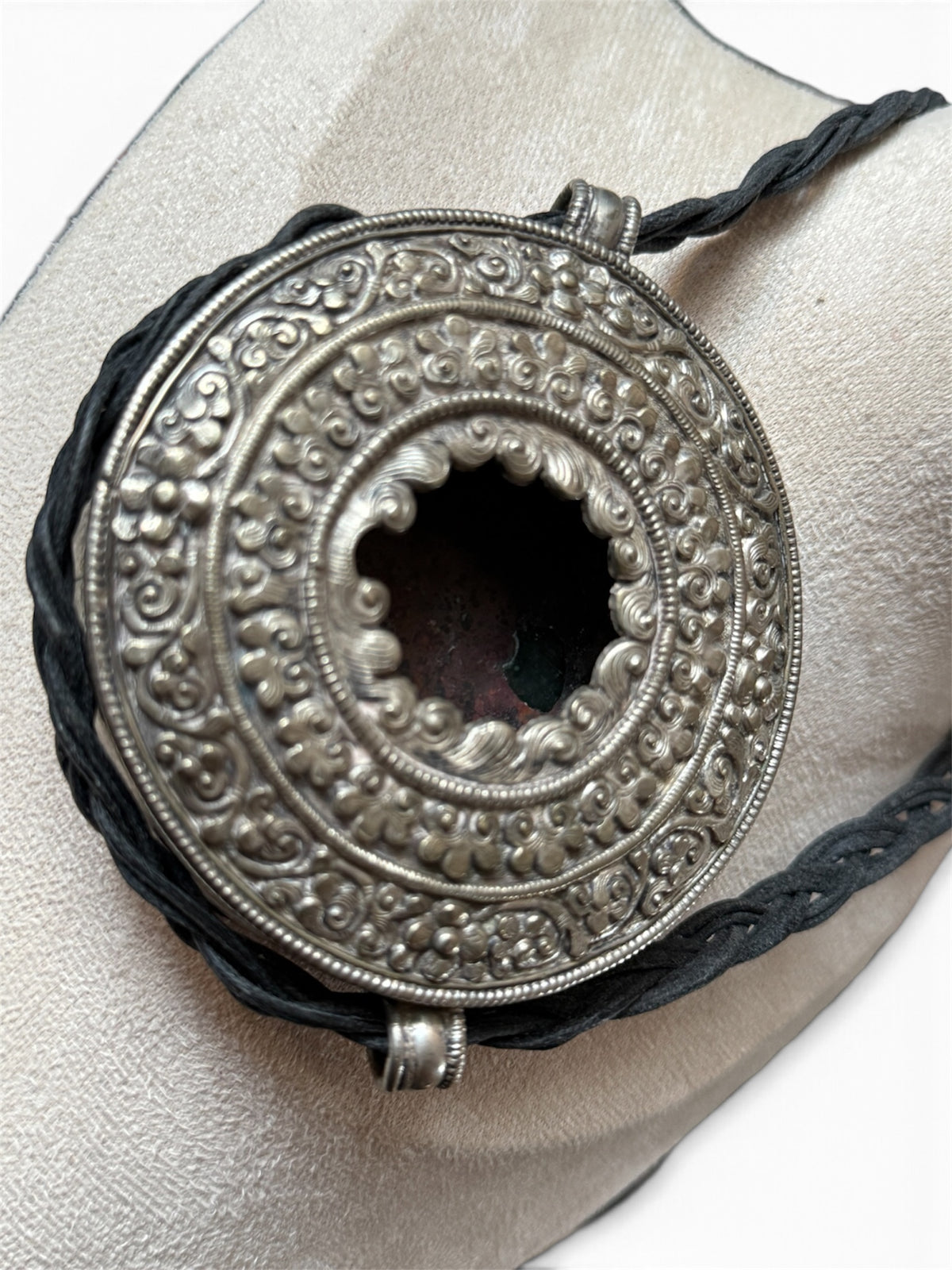 Antique Tibetan Silver Ghau (Portable Carrying Shrine) with Intricate Repoussé Decoration and Brass Back Cover