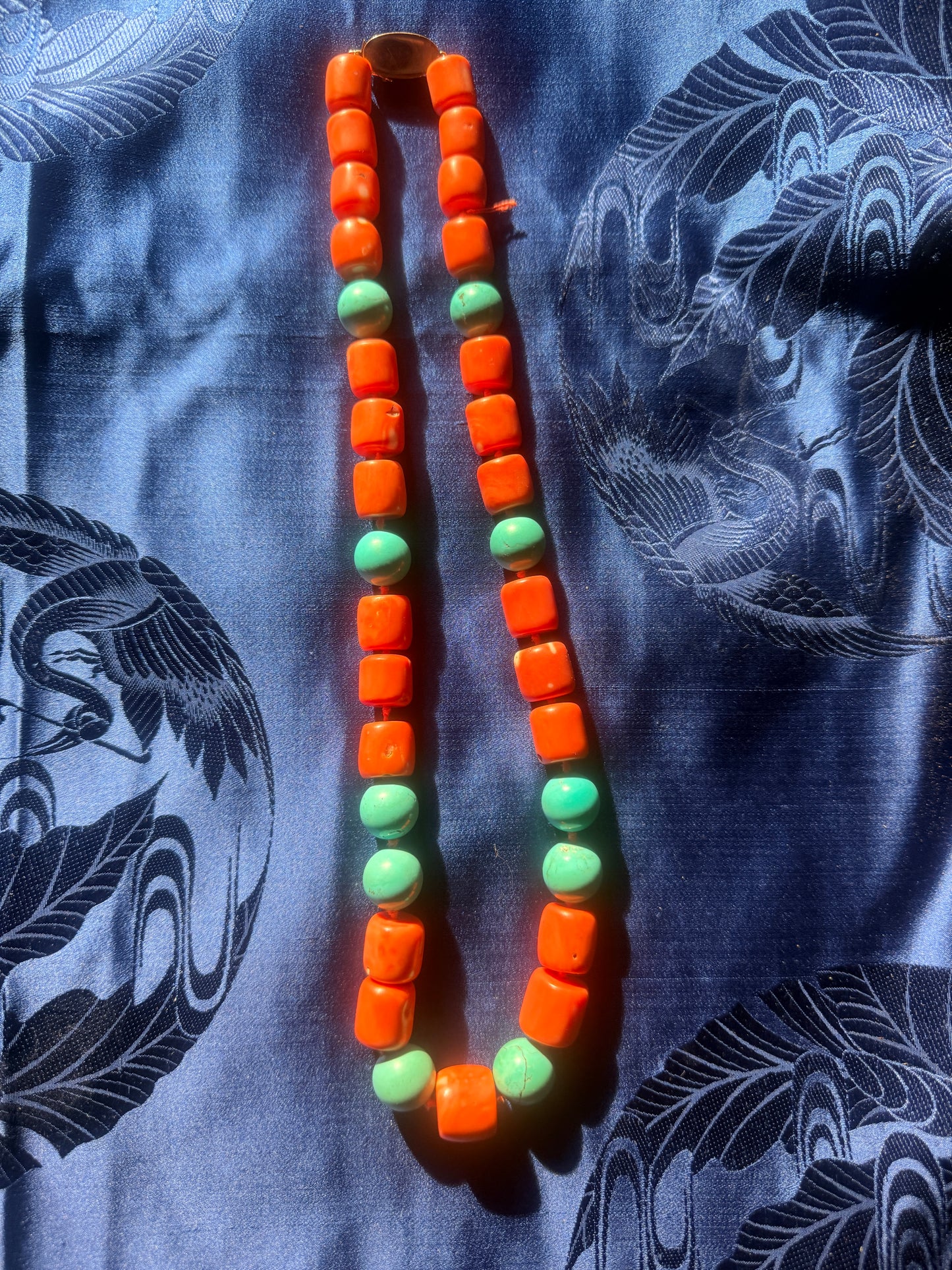 A coral and turquoise bead necklace