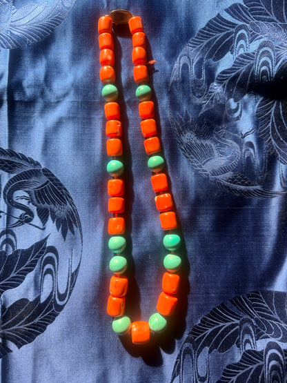 A coral and turquoise bead necklace