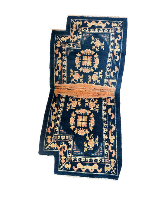 A vintage indigo saddle rug