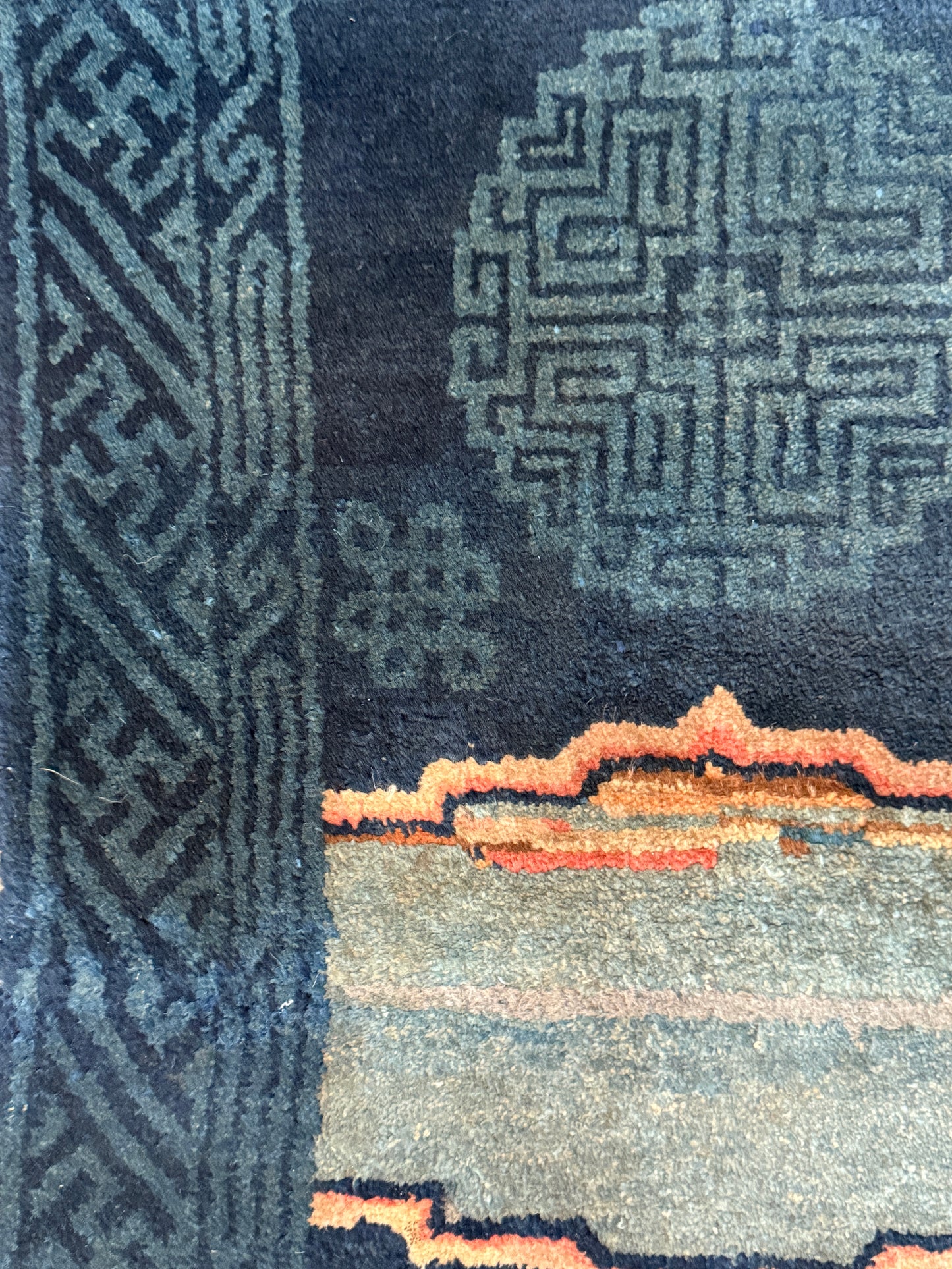 A vintage indigo Tibetan saddle rug
