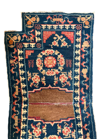 A vintage indigo saddle rug