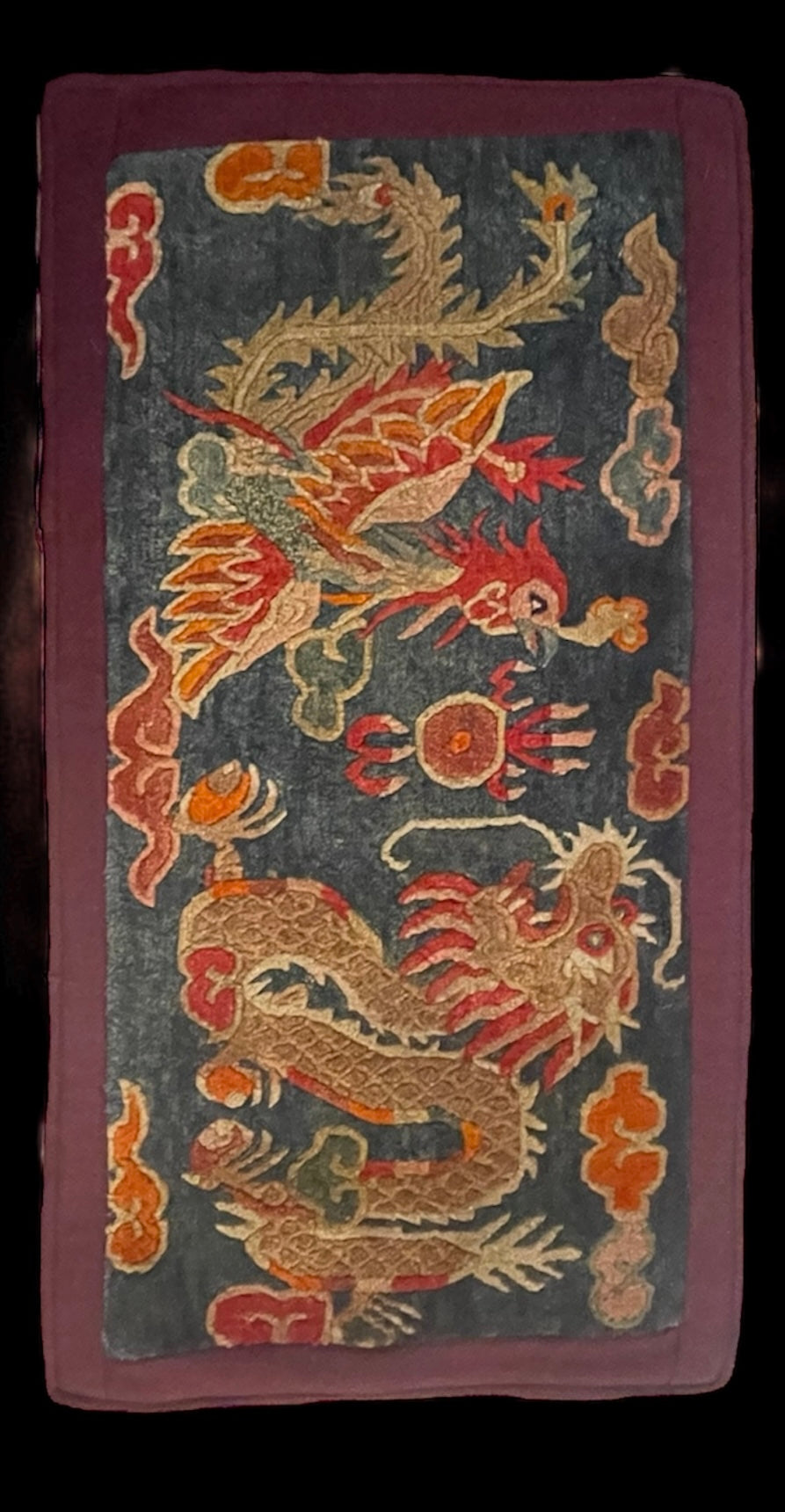 Early 20th C., antique Tibetan dragon and phoenix rugs