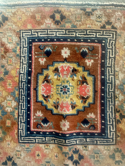Antique meditation seat rug