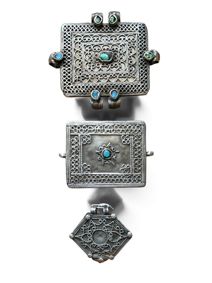 A set of three antique silver amulet boxes