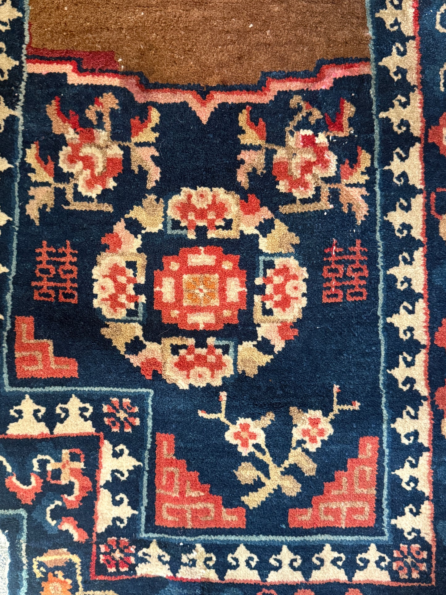 A vintage indigo saddle rug