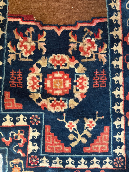 A vintage indigo saddle rug