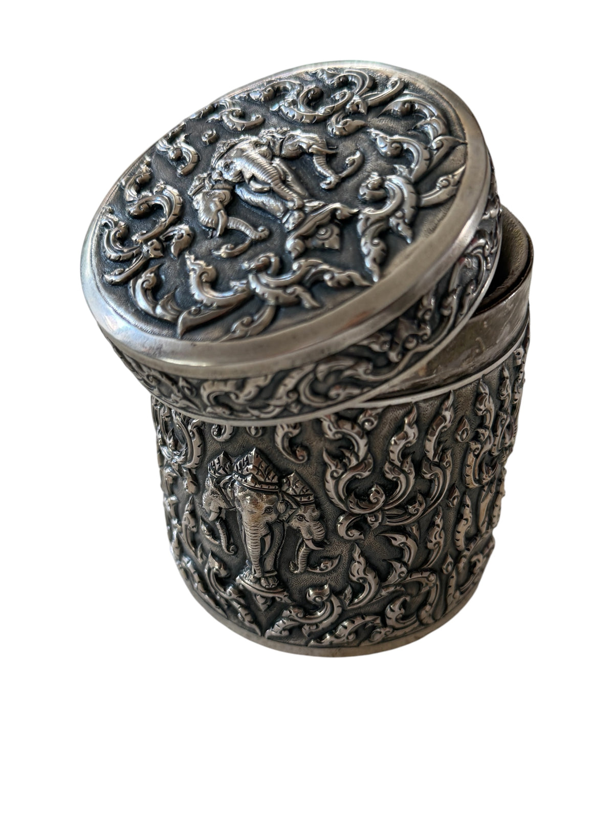 An antique cylindrical Thai silver box