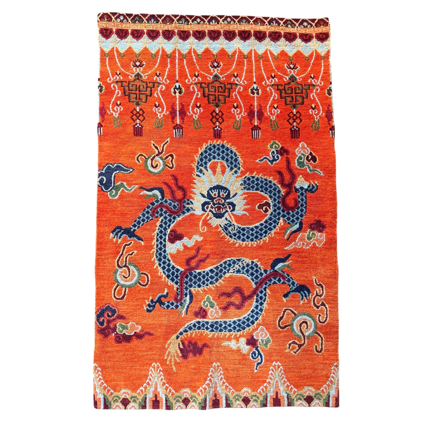 A vintage Tibetan dragon door rug