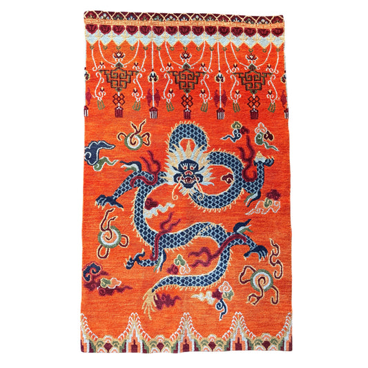 A vintage Tibetan dragon door rug
