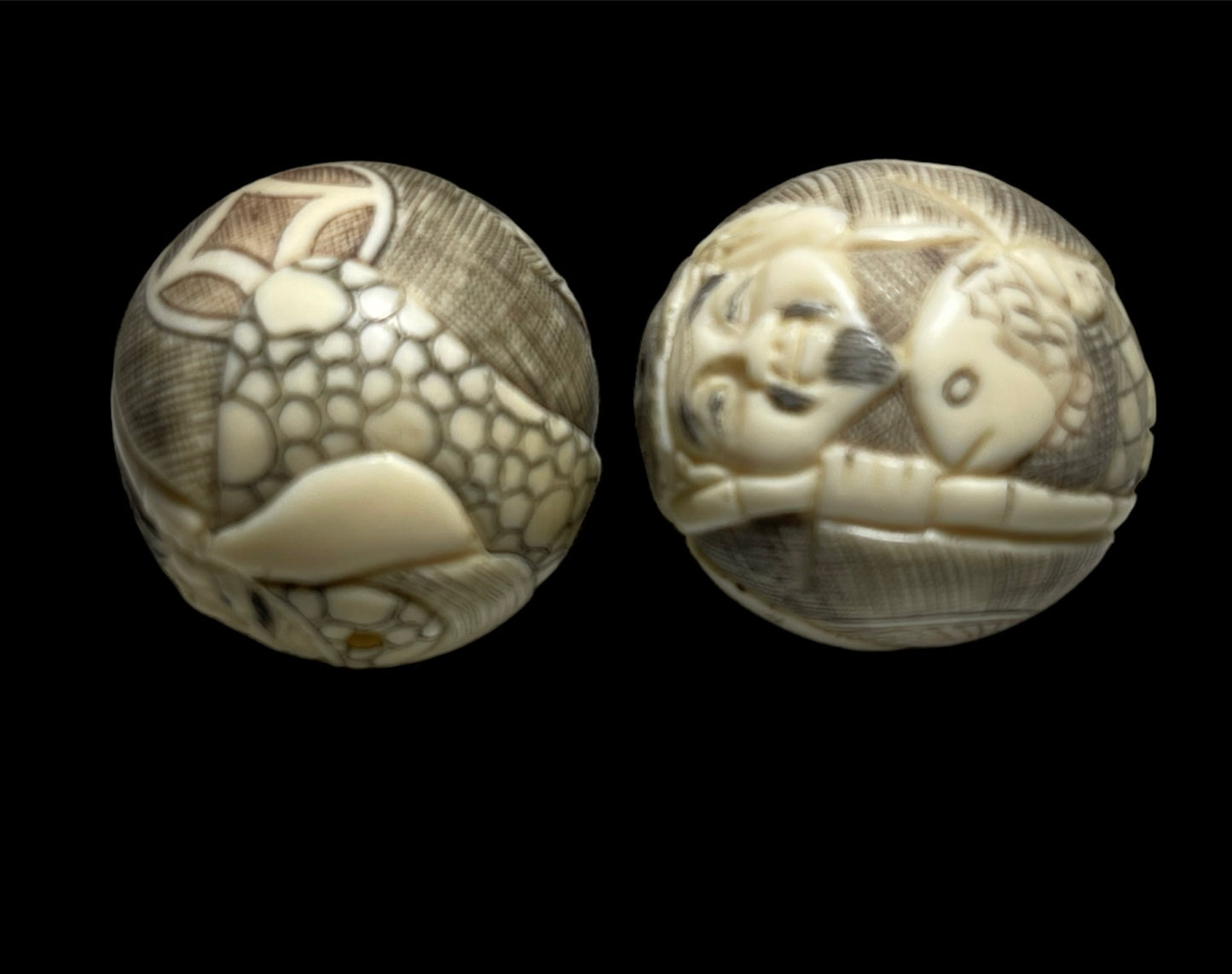 Two antique Japanese bone ojime beads
