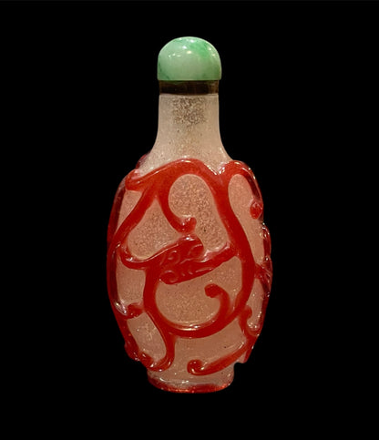 Peking glass snuff bottle - with jade cover and  bone scoop