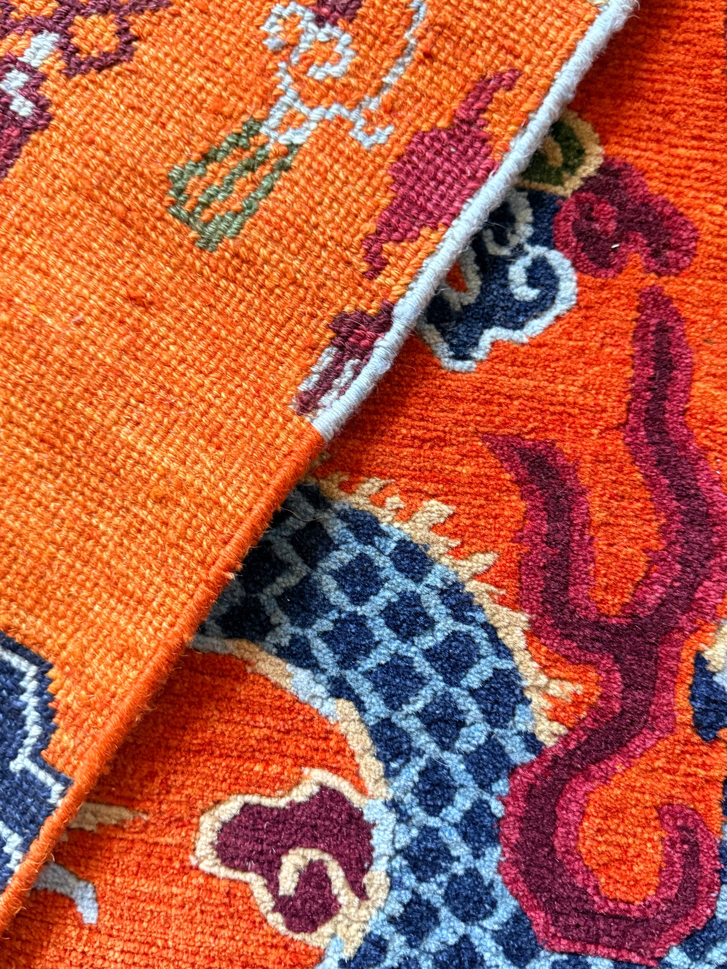A vintage Tibetan dragon door rug
